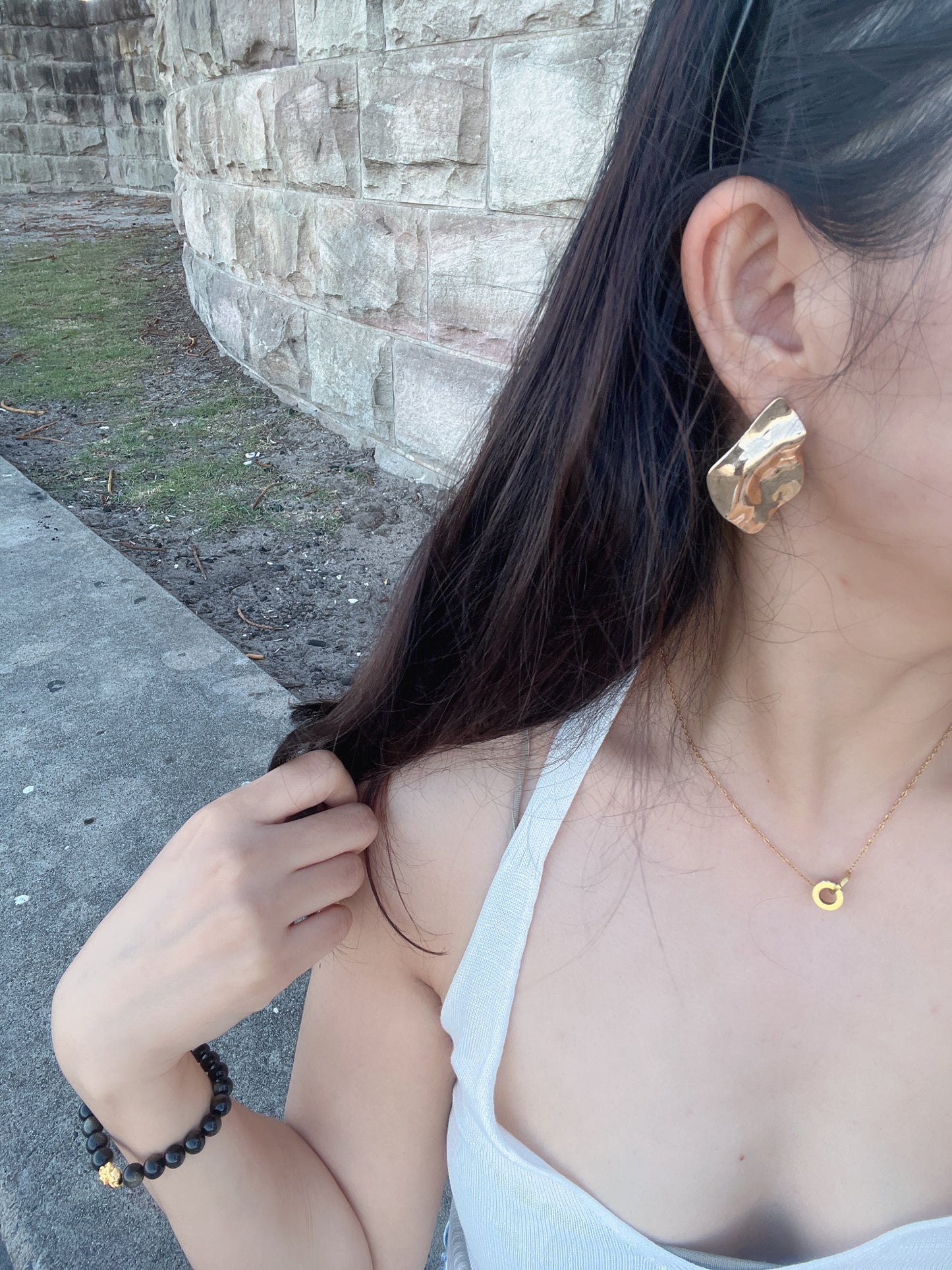 Gold plated wave modern stud earrings