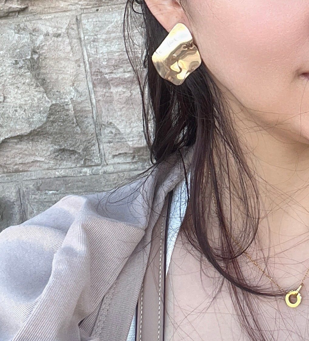 Gold plated wave modern stud earrings